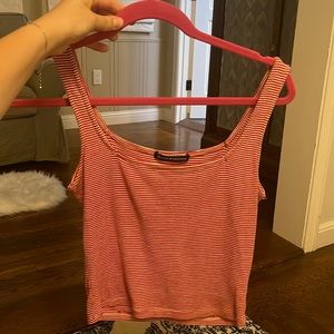 A staple piece in your closet. A cute red and white stripped tank.